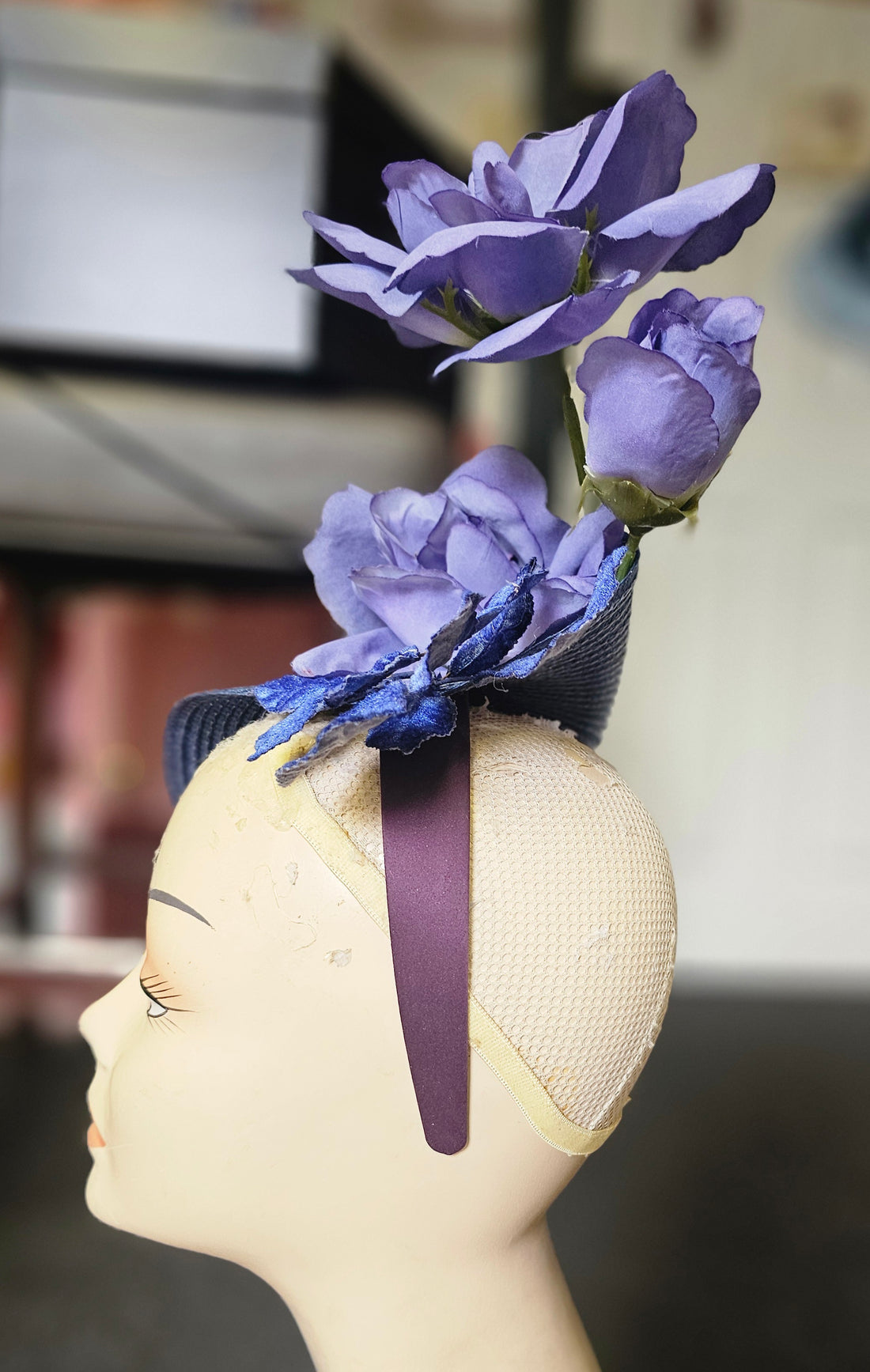 Purple, royal and navy flower hatinator.